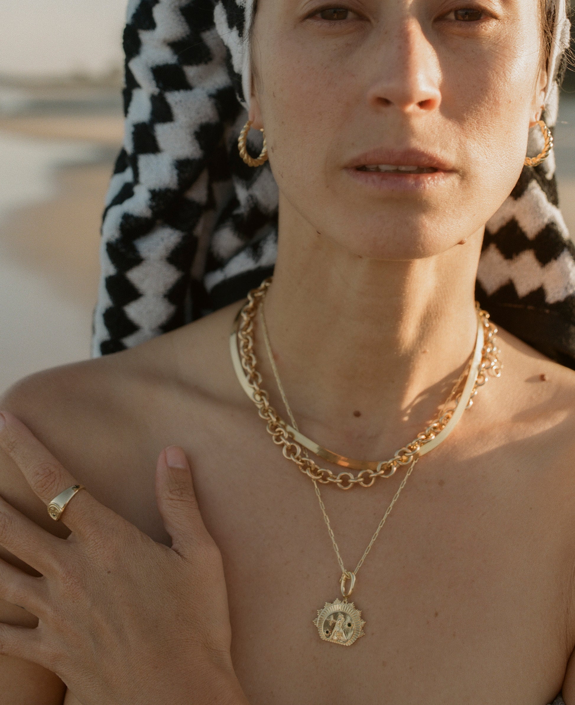 Woman wearing gold jewellery 