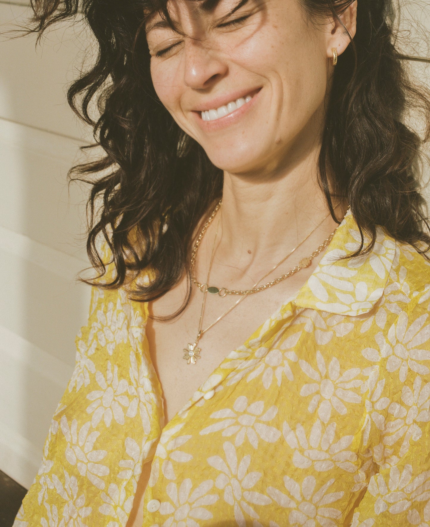 Woman wearing Small Gold Hoop Earrings