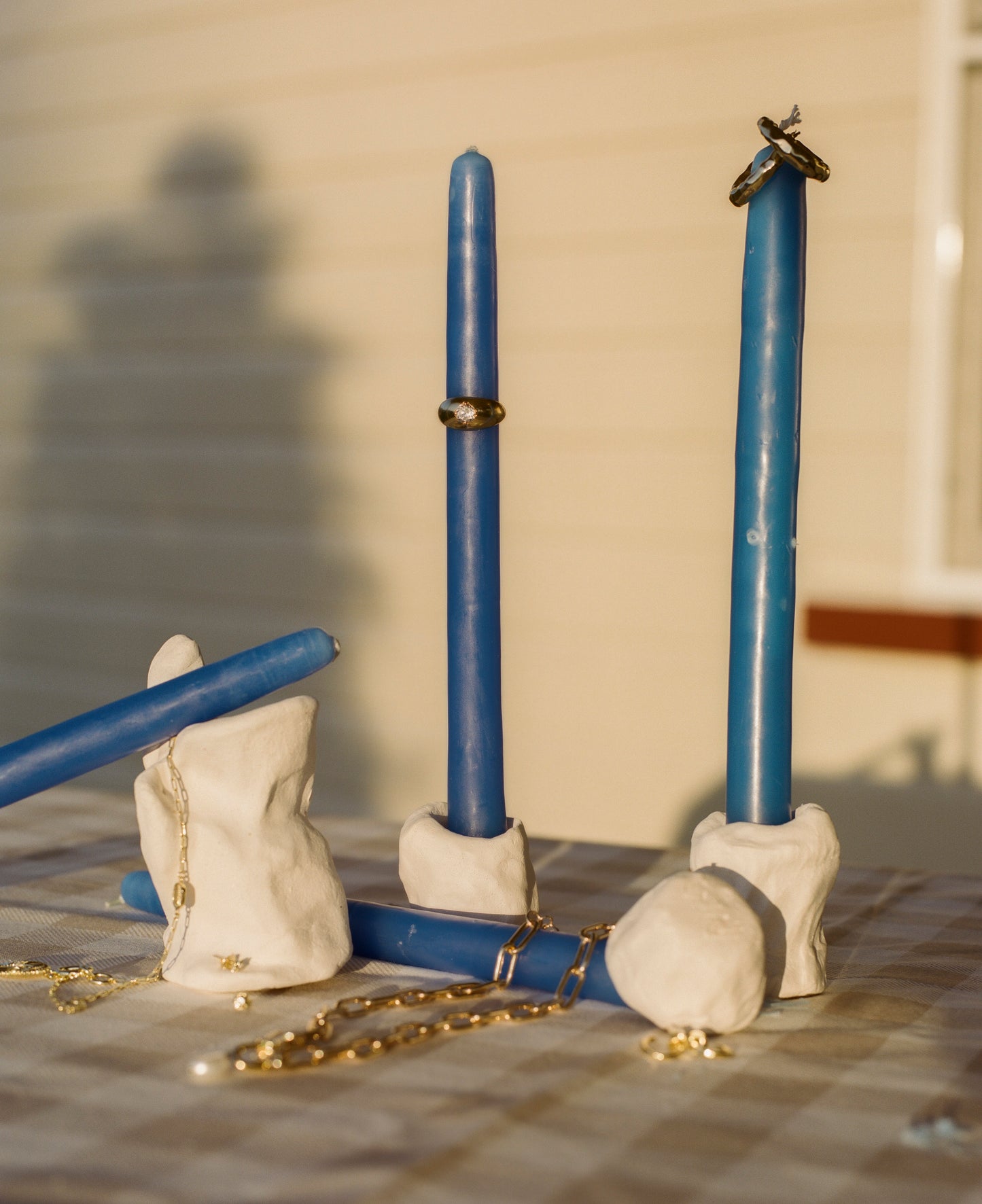 Blue candles and jewellery