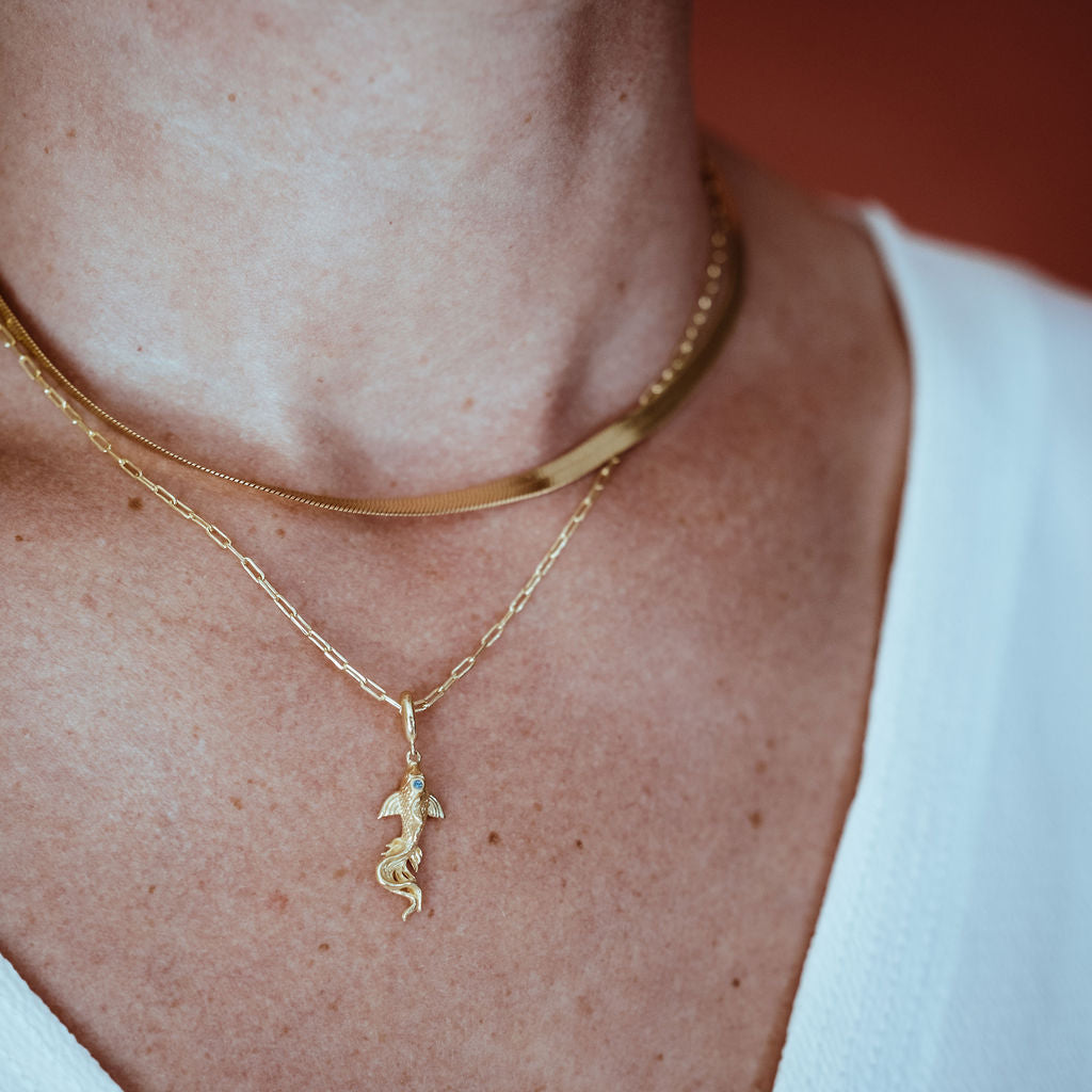 Gold necklace chain with fish pendant 